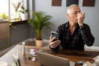 Phone reminding person with asthma to take meds