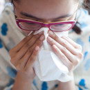  Person with a common cold bowing nose