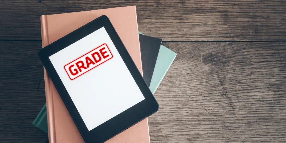 Tablet with the GRADE logo on it