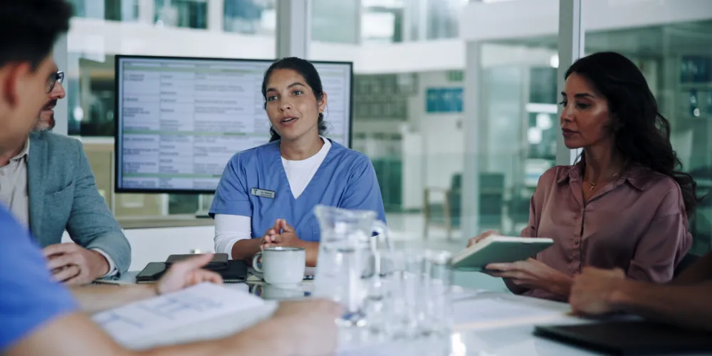 Meeting, team and doctor in boardroom for medical, healthcare and surgery strategy talk. 